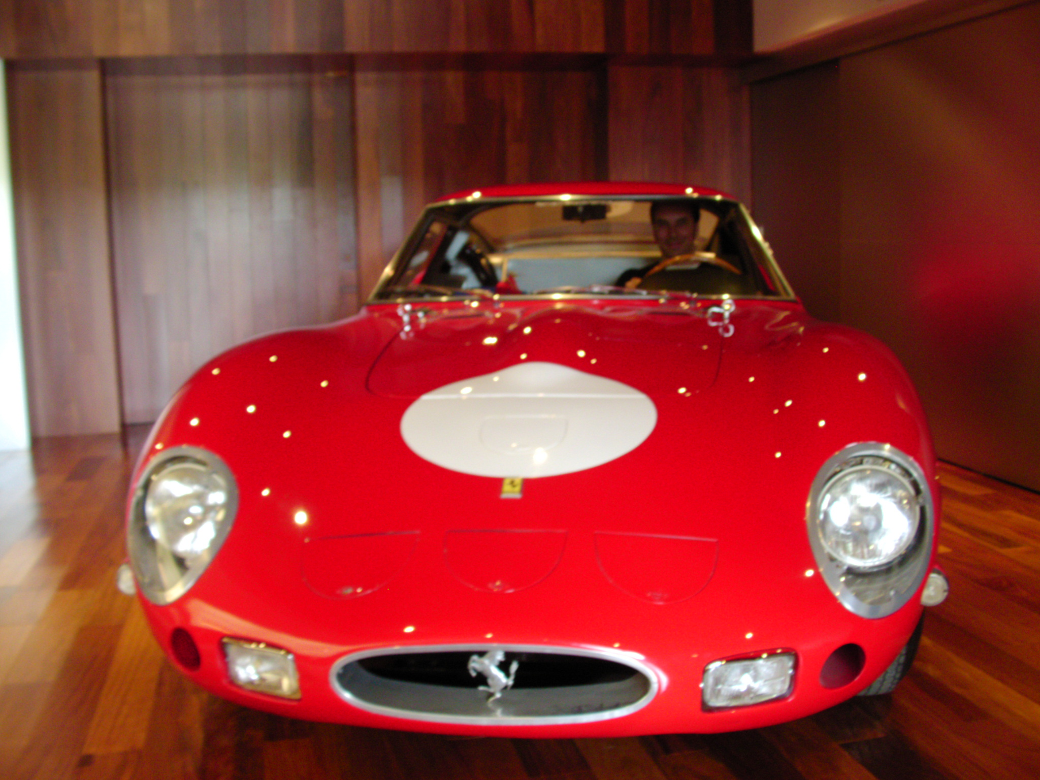 CarClimb co-founder Paul Lupson sitting in a Ferrari 250 GTO recreation